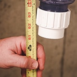 Measure PVC Piping With Tape Measure